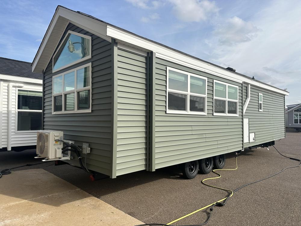 WINDOWS - SHORTENED - Exterior view of windows in living room & dining room from 60" to 36" tall
